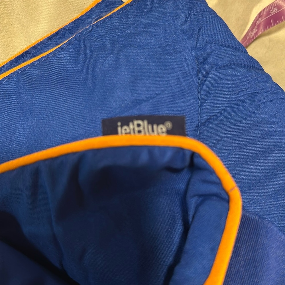 Brand new jetBlue, travel blanket. Airline pilot or flight attendant.